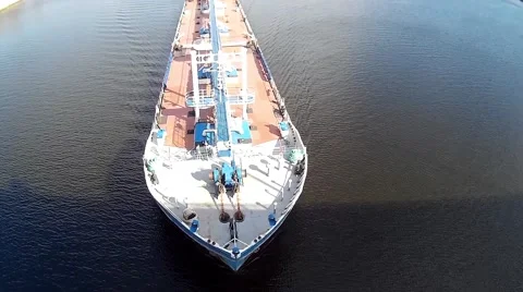 Cargo ship sailing under the bridge Stock Footage 68617925