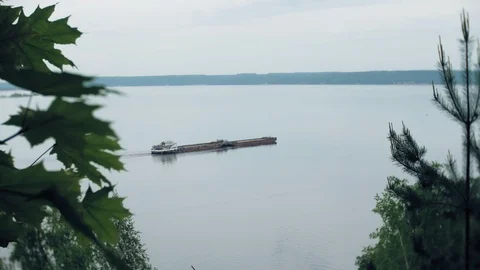 Cargo ship sails on the river Stock Footage 90836076