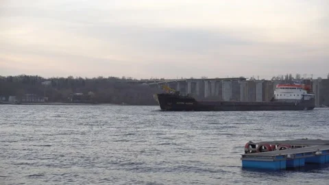 Cargo ship sails on the river Stock Footage 147598447
