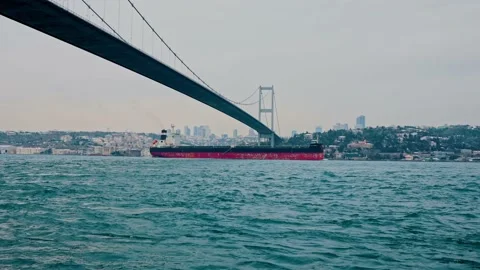 Cargo ship sails through the Bosphorus Stock Footage 172738538