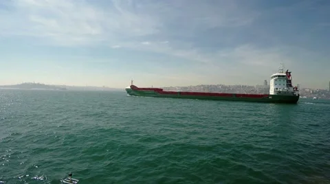 Cargo ship sails through the strait 스톡 동영상 49948488