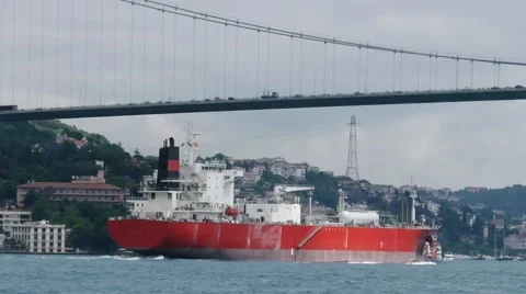 Cargo ship sails under the bridge Ataturk Stock Footage 65774107