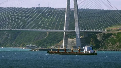 Cargo ship sails under the Yavuz Sultan Selim Bridge, Turkey Video stock 80523589