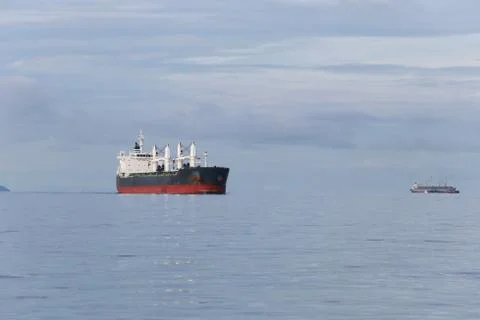 Cargo ship in the sea. Stock Photos
