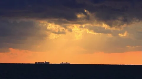 Cargo ship silhouette distant ocean sunset Bogliasco Italy Stock Footage 326465106