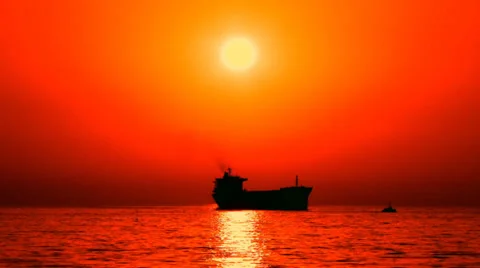 Cargo ship silhouette at sunset Stock-Footage 30844762