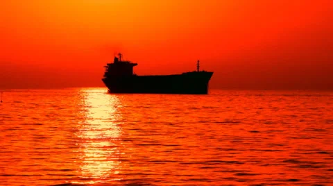 Cargo ship silhouette at sunset Stock-Footage 30845257