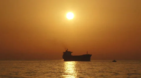 Cargo ship silhouette at sunset Stock-Footage 30845911