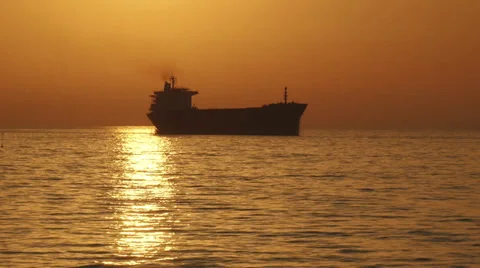 Cargo ship silhouette at sunset Stock-Footage 30846342