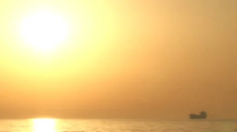 Cargo ship silhouette at sunset Stock-Footage 30928858