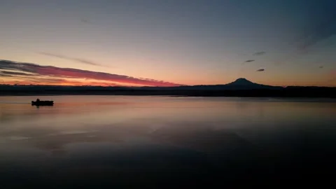 Cargo Ship slowly sailing on the Puget sound at sunset Stock Footage 294707038