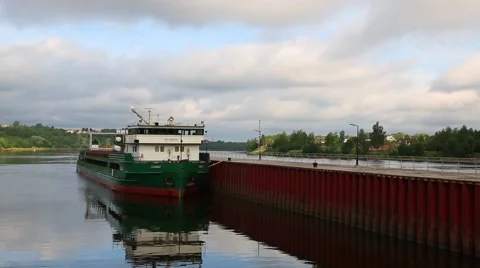 Cargo ship standing at the quay wall on Svir river Stock Footage 68498582