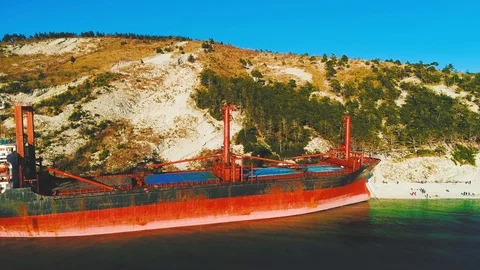 Cargo Ship is Stranded. The Storm Washed the Vessel Ashore. Aerial View Stock Footage 105711807