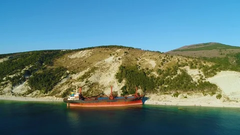 Cargo Ship is Stranded. The Storm Washed the Vessel Ashore. Aerial View Stock Footage 105719908
