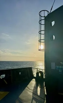 Cargo Ship Superstructure Silhouette at Sunset Stock Photos