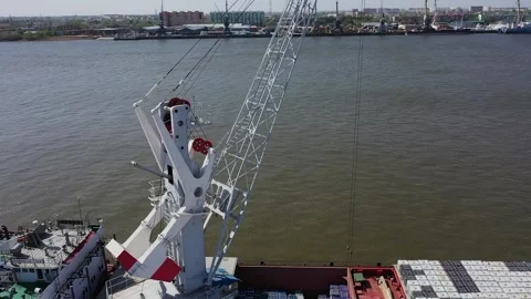 Cargo ship unloading containers at harbor Stock-Footage 347518554