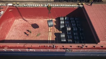 Cargo ship unloading in port Stock Footage 85629034