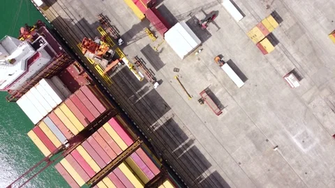 Cargo Ship Unloading In Port Stock Footage 168955430