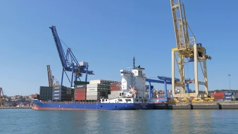 Cargo ship vessel loading containers in Lisbon port harbor slow motion 4k Stock Footage 120155732