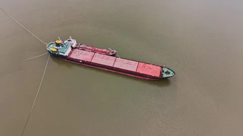 Cargo ship waits at the shipyard for loading and unloading tasks 動画素材 337941169