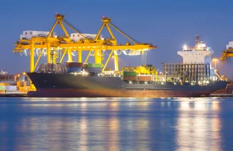 Cargo ship working with crane Stock Photos