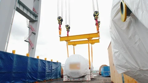 Cargo shipping - lifting and moving the cargo on the long ropes Stock Footage 118550176