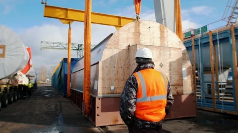 Cargo shipping - a man worker standing on the construction site Stock Footage 118566676