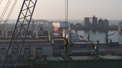 Cargo ships and dockside cranes across Port of Veracruz harbor, aerial Stockbeeldmateriaal 345178540