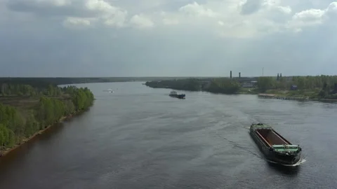 Cargo ships. Empty barges float down the river to transport timber or sand Video stock 155184951