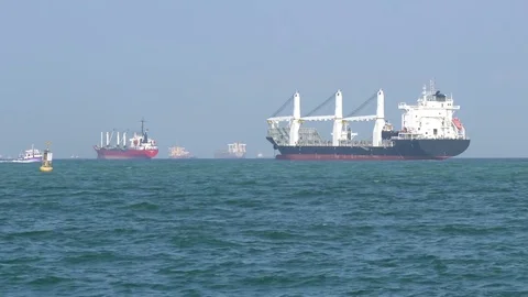 Cargo ships floating on the sea Stock Footage 84159885
