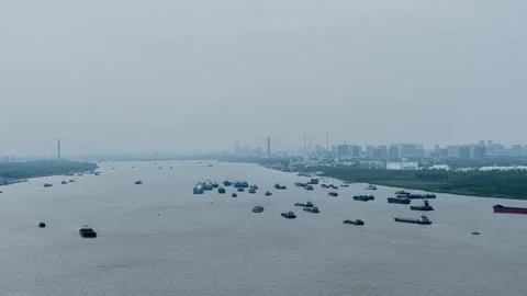 Cargo Ships Navigating on Yangtze River Waterway Cityscape Time-lapse Stock Footage 326706651