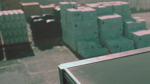 Cargo is stacked in a warehouse ready for shipping and distribution Vídeo Stock 344057814