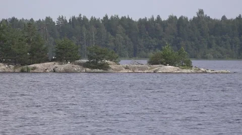 Cargo steamship Lauri discovers from behind a rocky isle Stock Footage 65797426