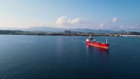 A cargo tanker floating on the sea. Delivery of cargo by sea. Stock Footage 276372653