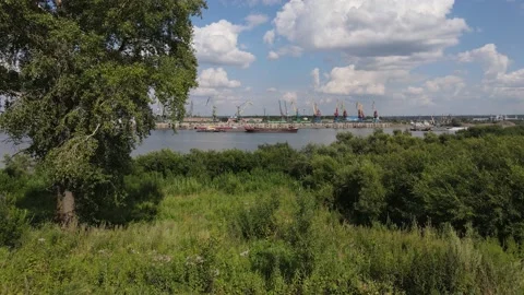 Cargo terminal on Siberian river Stock Footage 136433634