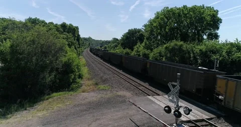 Cargo train carrying coal through rural Kansas, aerial drone shot Stock Footage 167362910