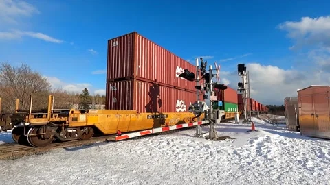 Cargo Train carrying containers in Ontario Canada Stock Footage 148979871