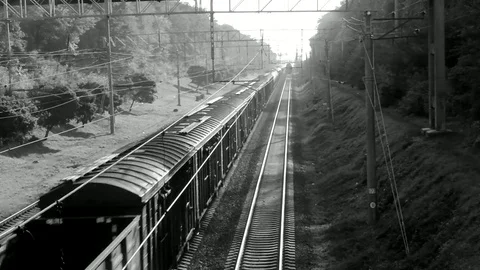 Cargo Train In Fast Motion On The Top View In Black White Vidéo 84683379