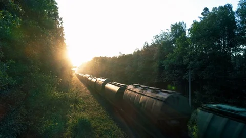Cargo Train Going into Sunset, Aerial View Video stock 91778824
