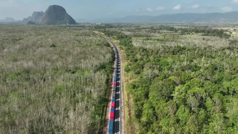 Cargo Train with Mountain in malaysia Stock Footage 273031735