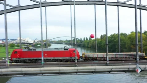 Cargo Train Moving On Railroad Bridge. Frankfurt City Bridge Stock Footage 229485801