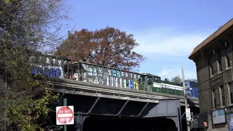 Cargo Train in NYC standing on tracks. Elevated Train tracks Stock Footage 200797093