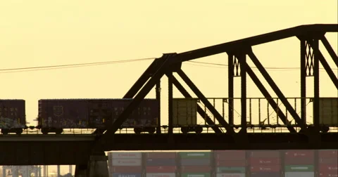 Cargo train passing over the Newark Bay Bridge Stock Footage 51297246