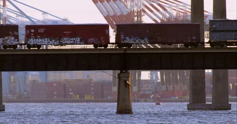 Cargo train passing over the Newark Bay Bridge Video stock 51297247