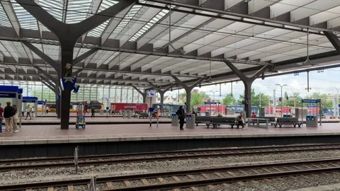 Cargo train is passing through Rotterdam Central station. Netherlands Stock Footage 280863705