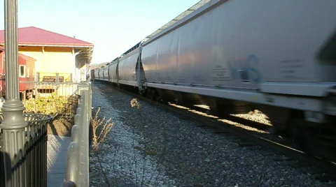 Cargo Train Passing By The Train Station 스톡 동영상 688824