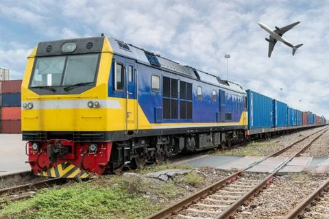 Cargo train platform with freight train container with cargo airplane at depo Stock Photos