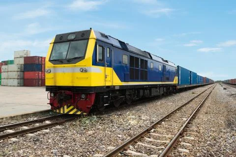 Cargo train platform with freight train container at depot use for Import, Ex Stock Photos