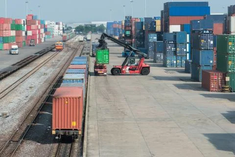 Cargo train platform with freight train container at depot in port use for ex Stock Photos