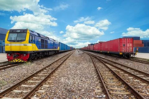 Cargo train platform with freight train container at depot in port use for ex Stock Photos